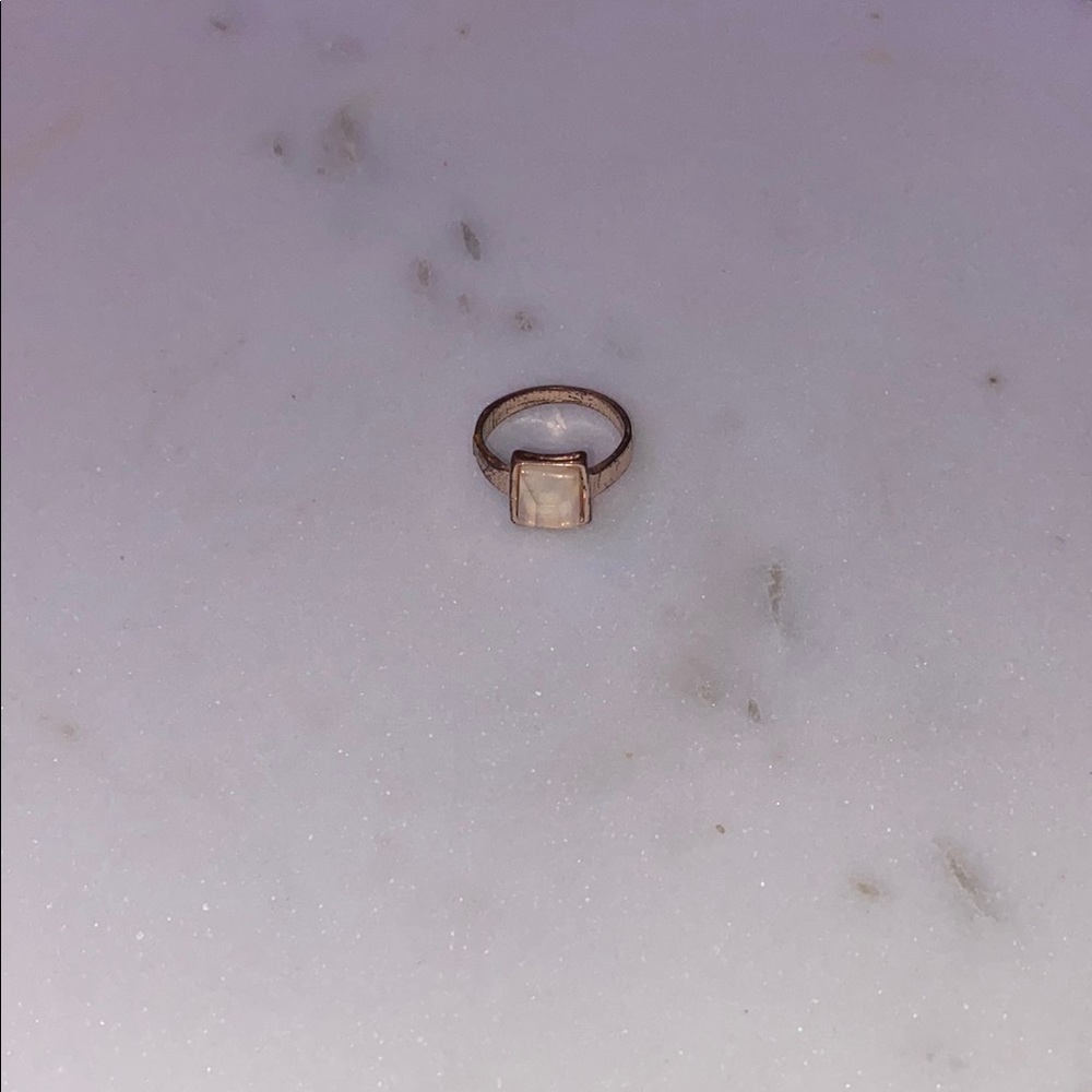 Elegant Gold Ring with Cream Stone